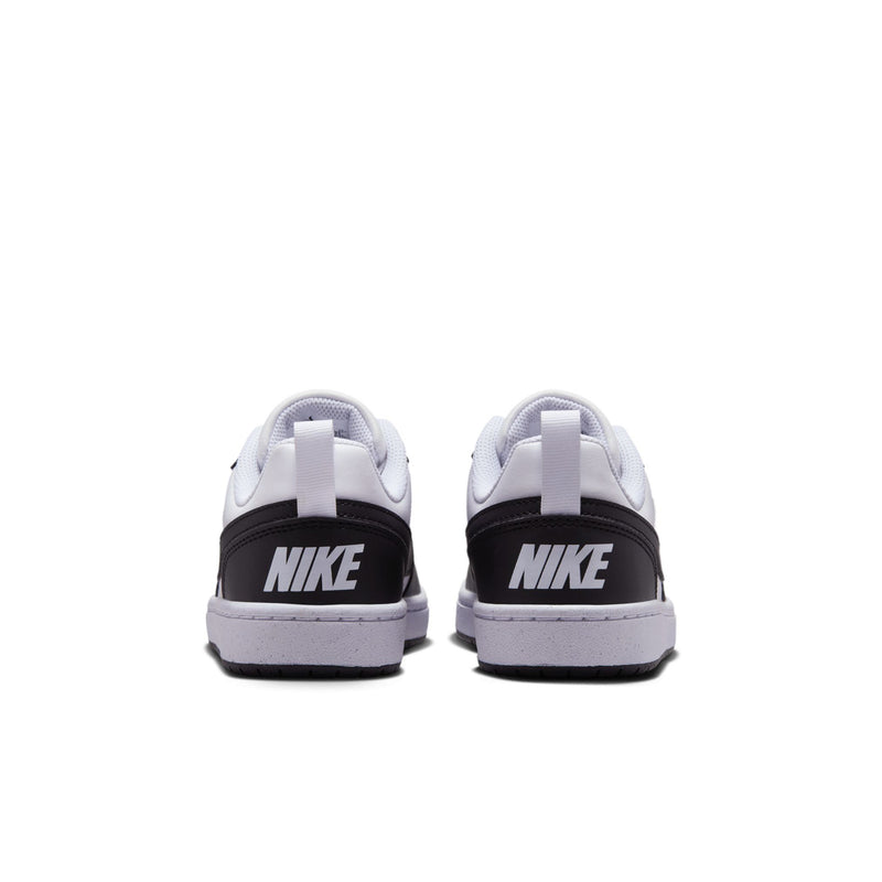Youth sneakers from the back: white uppers with black heel panel and NIKE branding