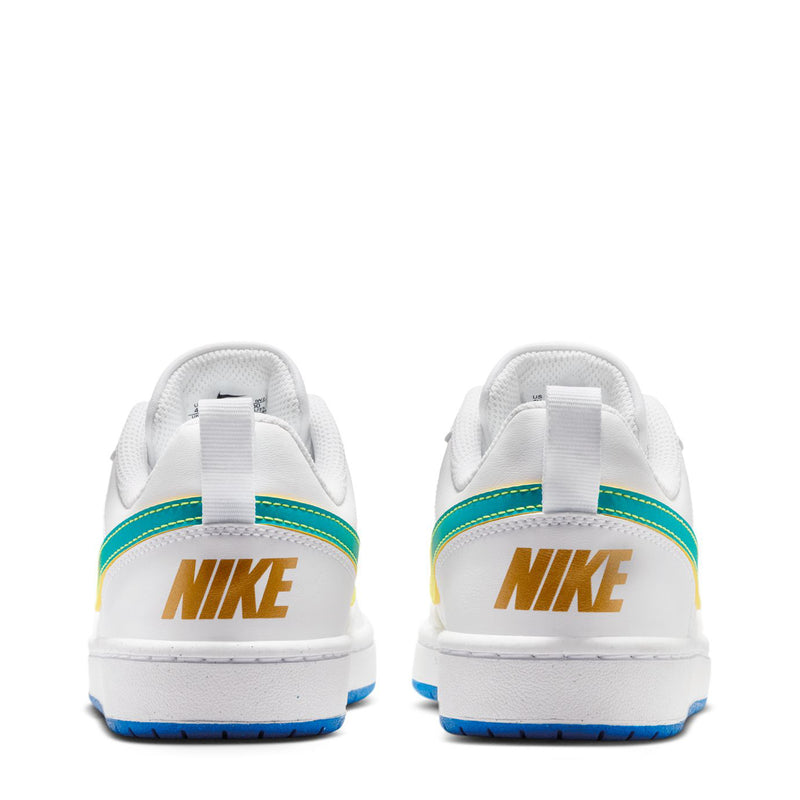 Youth low-top sneakers, white heel with NIKE logo, green stripe, yellow accent, blue outsole