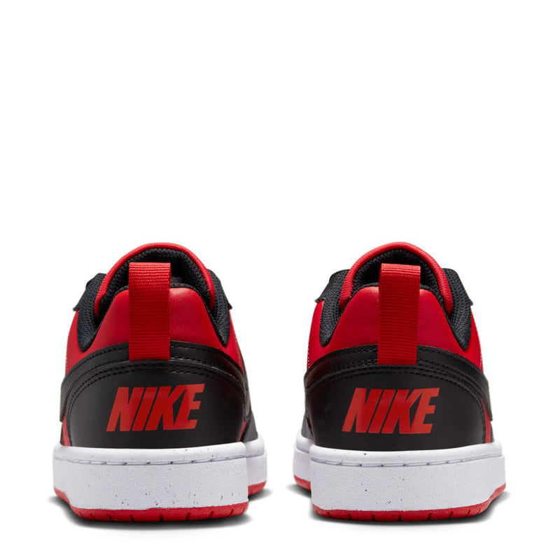 Youth low-top sneakers rear view with red pull tab and black NIKE logo on heel