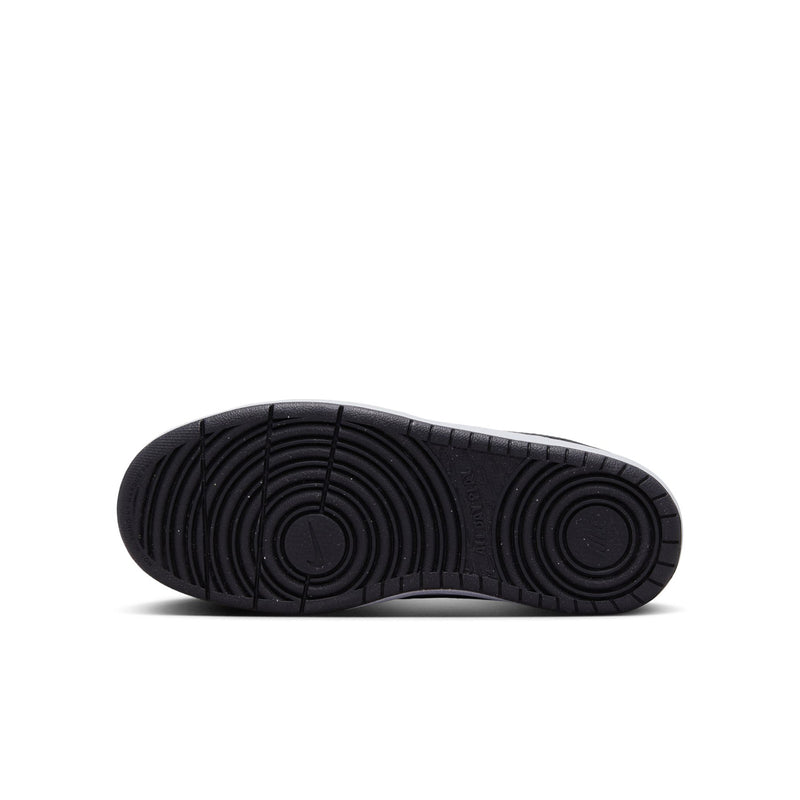 Shoe outsole view: dark rubber tread pattern with circular pivot details