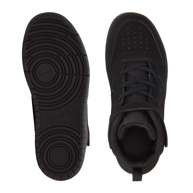 Kids black sneaker outsoles and tongue view, textured tread sole