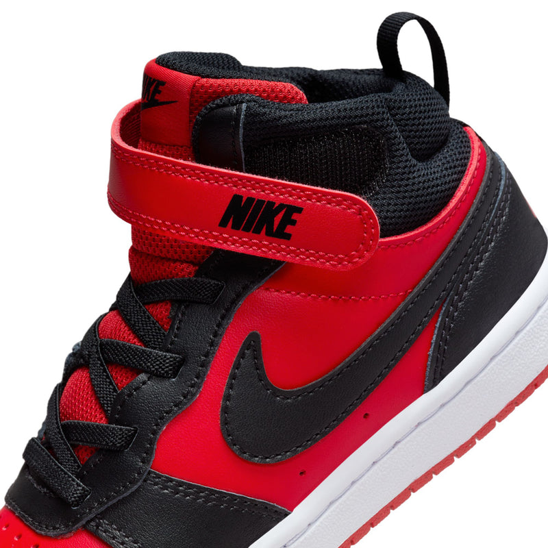 Kids mid-top sneakers, side view, Nike swoosh on red and black with black collar