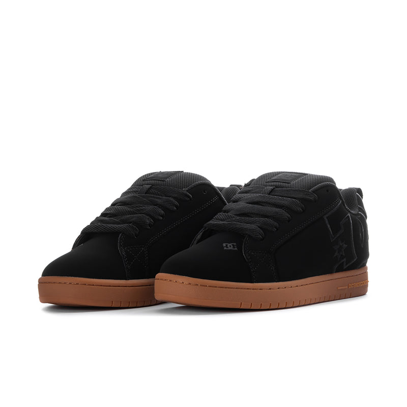 Pair of black skate shoes with lace-up front and gum rubber sole