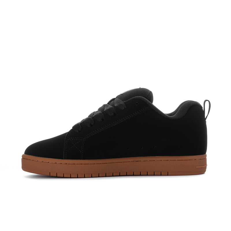 Black low-top skate sneaker with lace-up design and gum sole