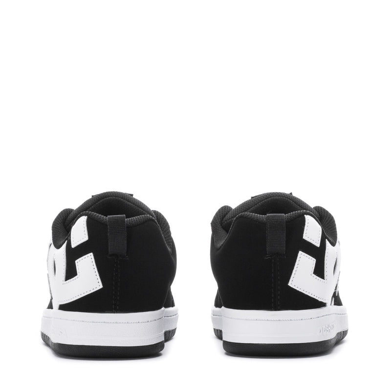 Youth black low-top sneakers with white heel logos and white midsole