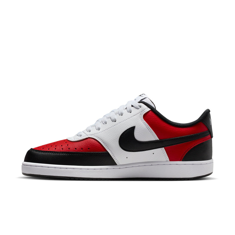 Low-top lace-up sneakers in white, red, and black with black swoosh and perforations.