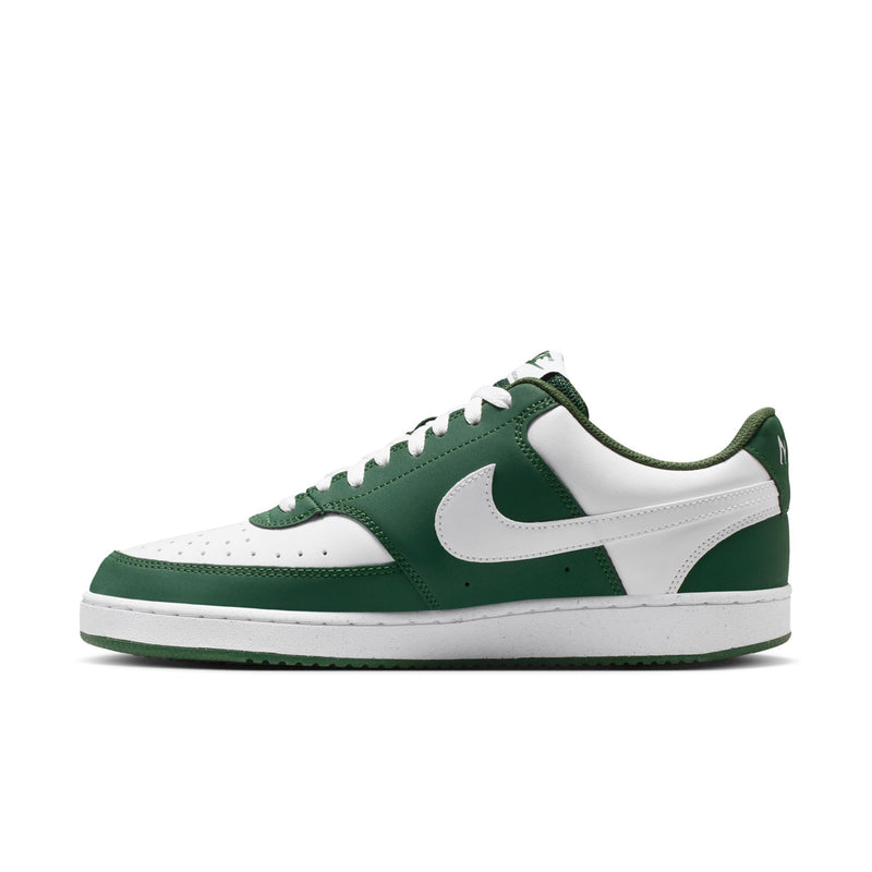 Green and white low-top lace-up sneaker with white swoosh and stitched overlays
