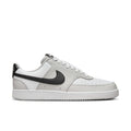 Low-top men's sneaker in white with gray and black swoosh accents, lace-up.