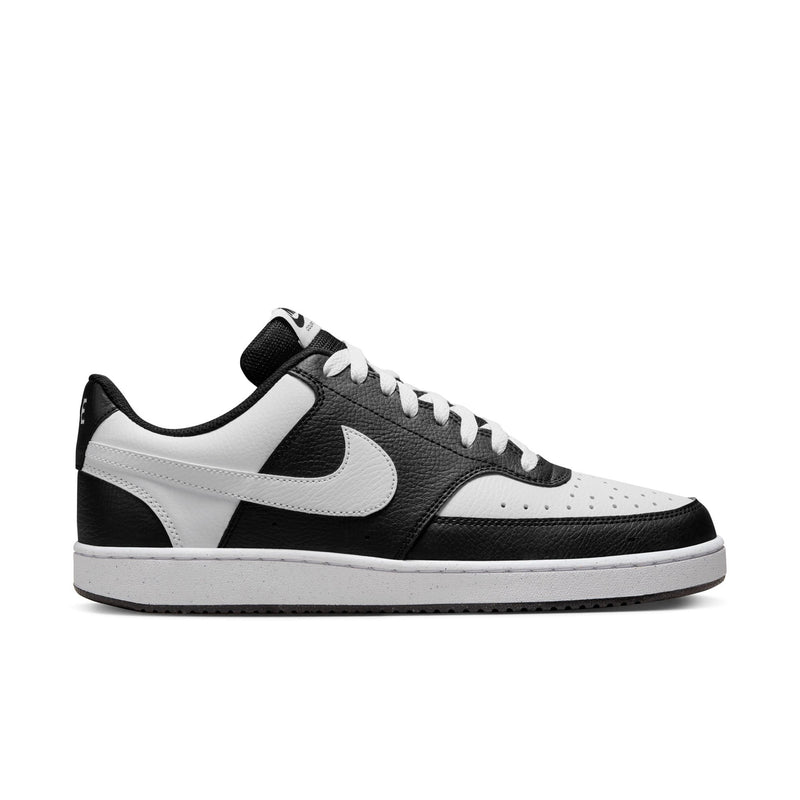 Men's low-top sneakers in black and white, with Nike swoosh and lace-up design.