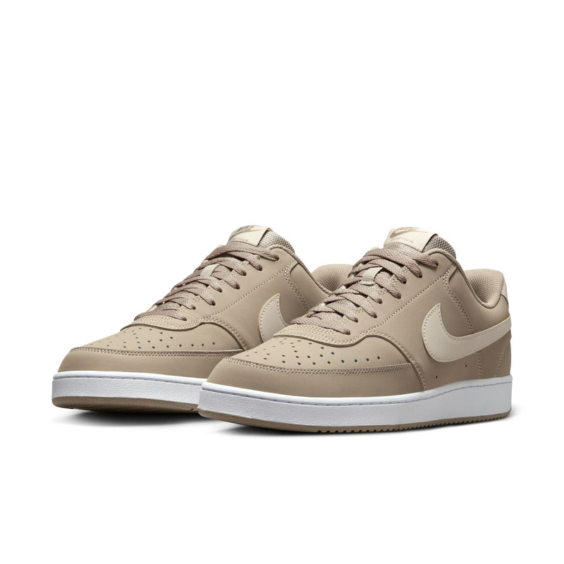 Men's low-top sneakers, light tan upper with white sole and lace-up closure