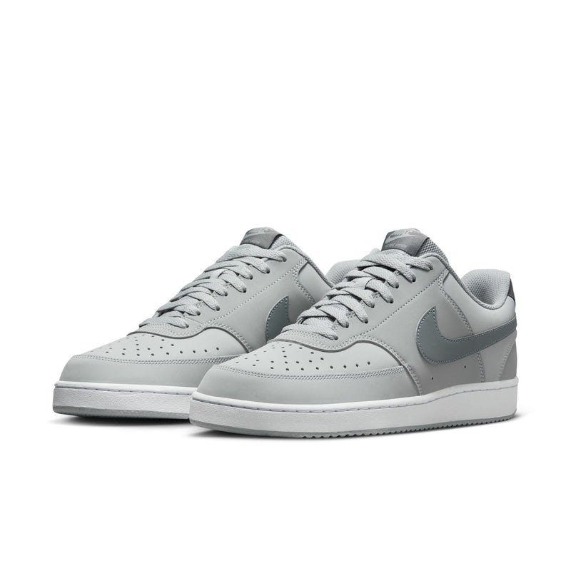 Pair of men's low-top sneakers in light smoke grey, lace-up design with matching panels
