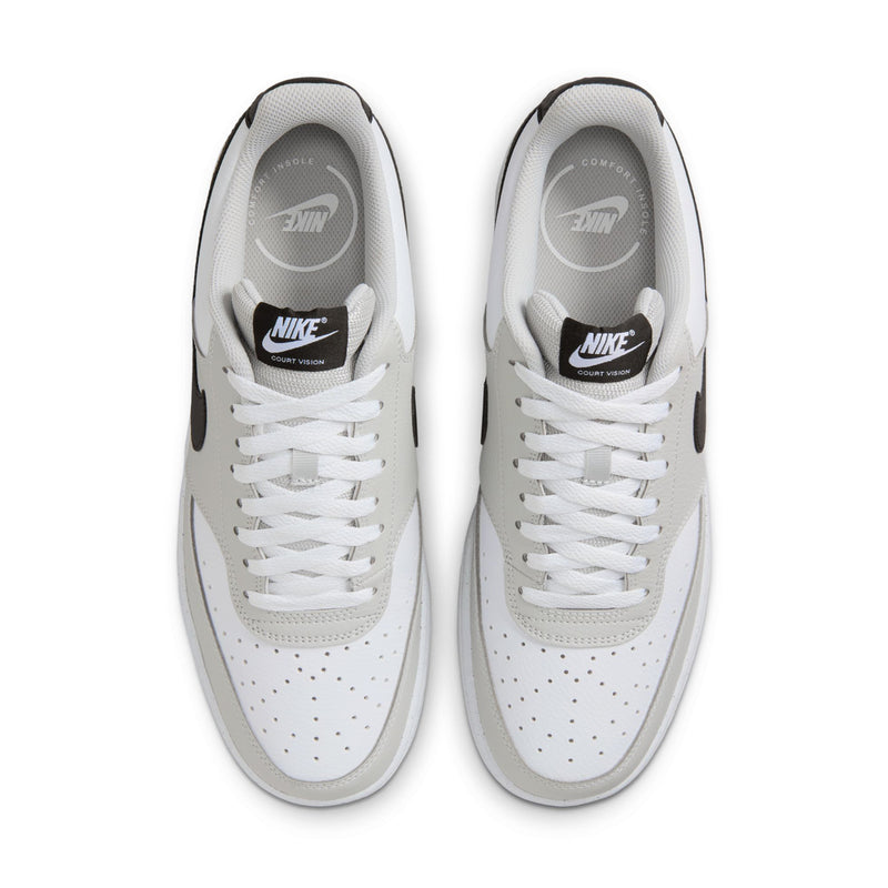 Low-top men's sneakers, white uppers with gray soles and black heel logo on tongue.