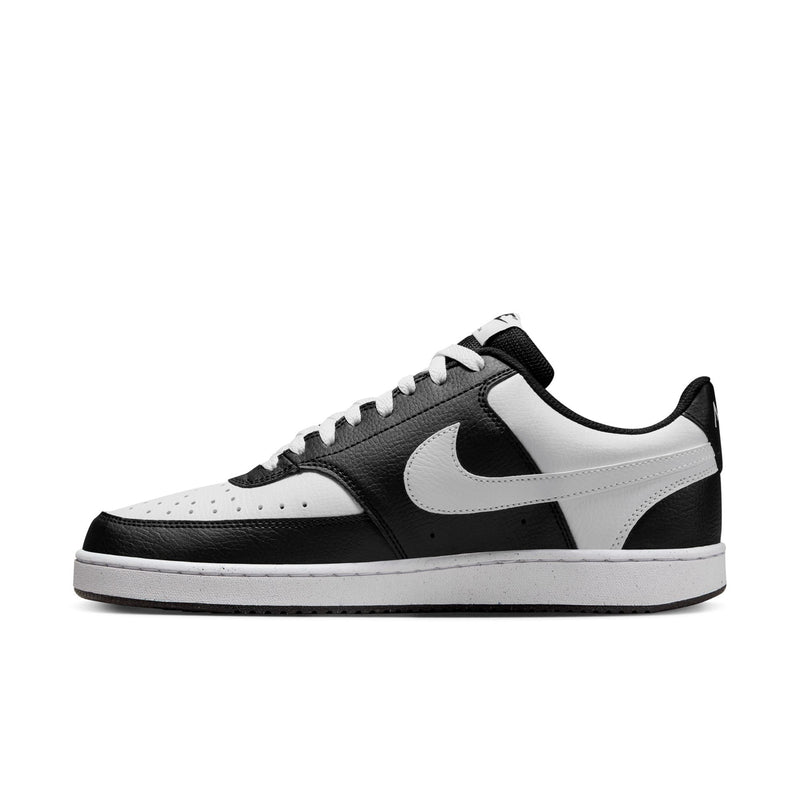 Men's low-top sneakers, black and white, textured toe and lace-up front.