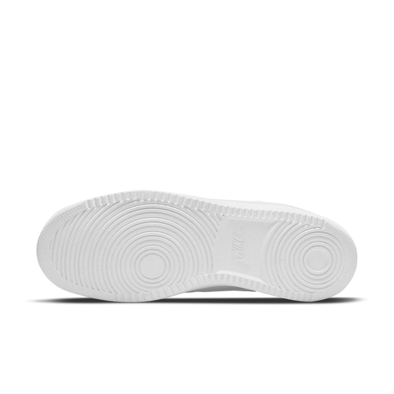 White rubber outsole for low-top sneakers with circular traction pattern