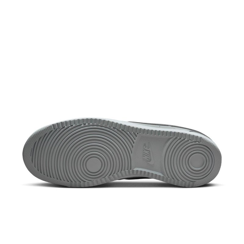 Men's low-top sneakers outsole in light grey with circular traction pattern