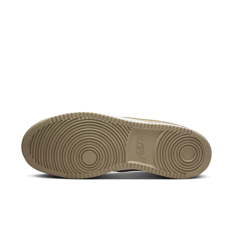 Men's low-top sneaker outsole, light tan rubber with circular traction pattern