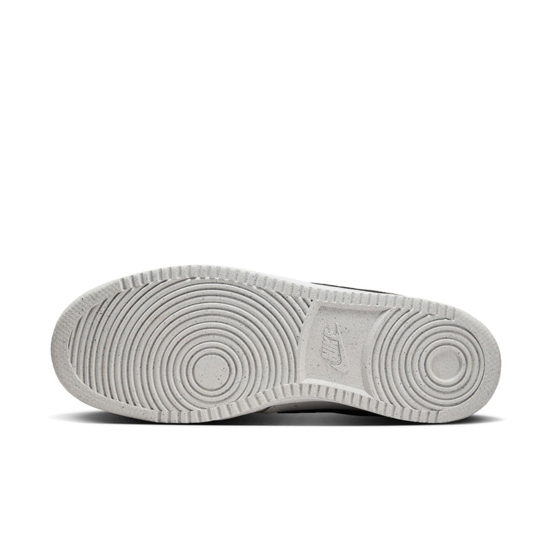 Rubber outsole for low-top men's sneaker in light gray, circular tread pattern.