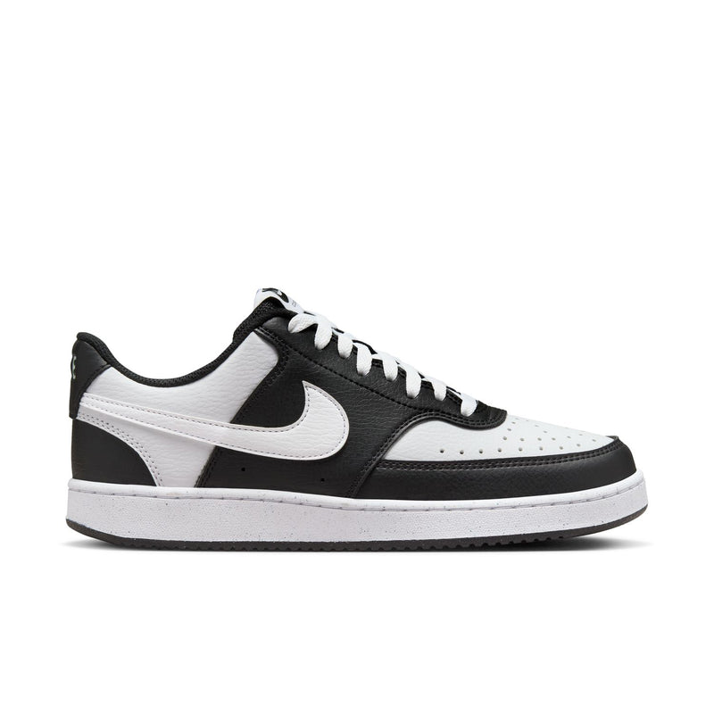 Women's low-top sneakers in black and white, leather-look with swoosh and lace-up design
