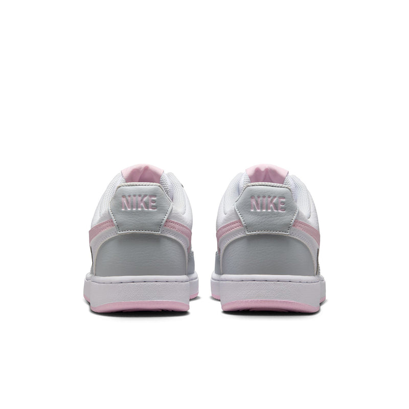 Women’s low-top sneakers heel view in light gray with pink trim along the sole.