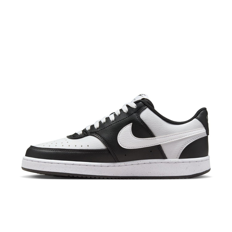 Women's low-top sneakers, angled side; white base with black overlays and swoosh