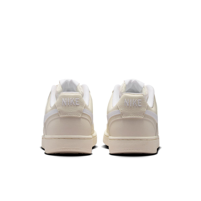 Women’s low-top Nike Court Vision sneakers, cream leather with light blue swoosh