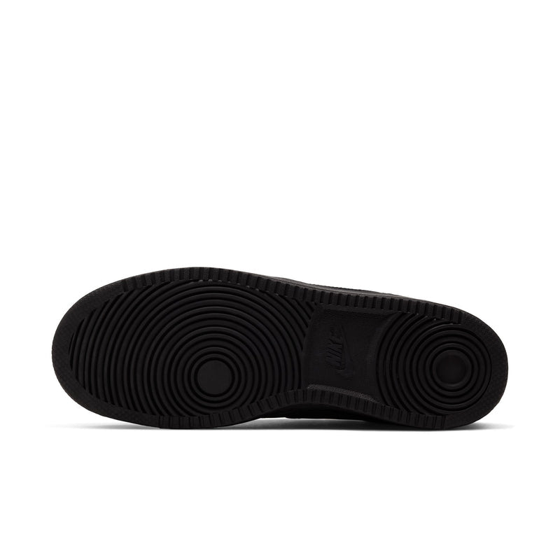 Black rubber outsole for men's mid-top sneakers with circular traction pattern