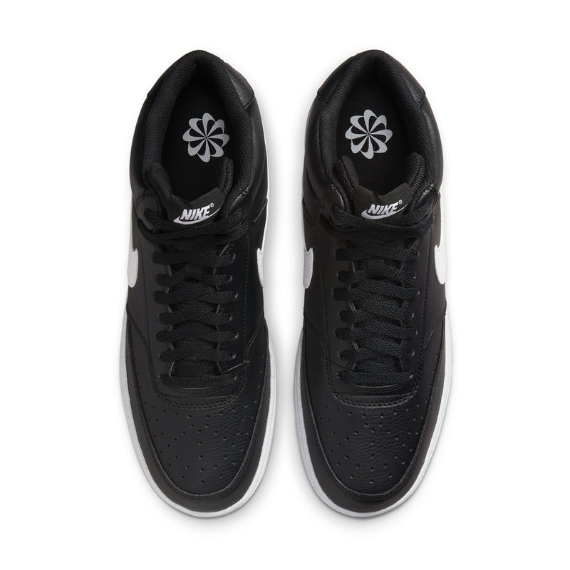Black sneaker tongues with Nike logo on the top
