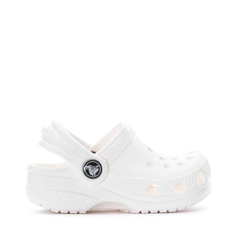Infant white Crocs clog with heel strap, round toe, and perforated upper.