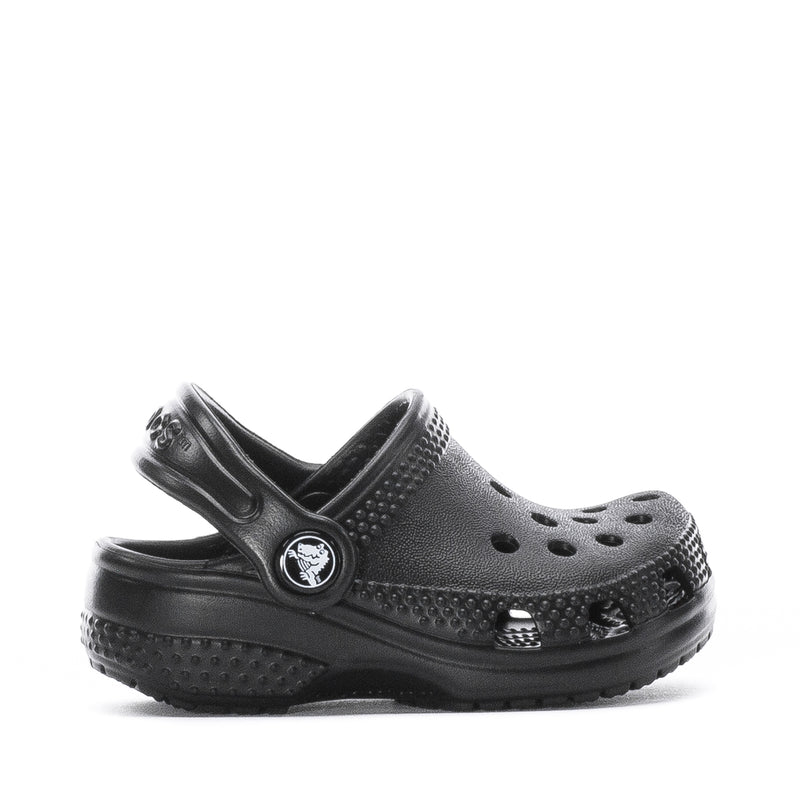 Infant black slip-on clog with perforated upper and adjustable heel strap, Crocs logo