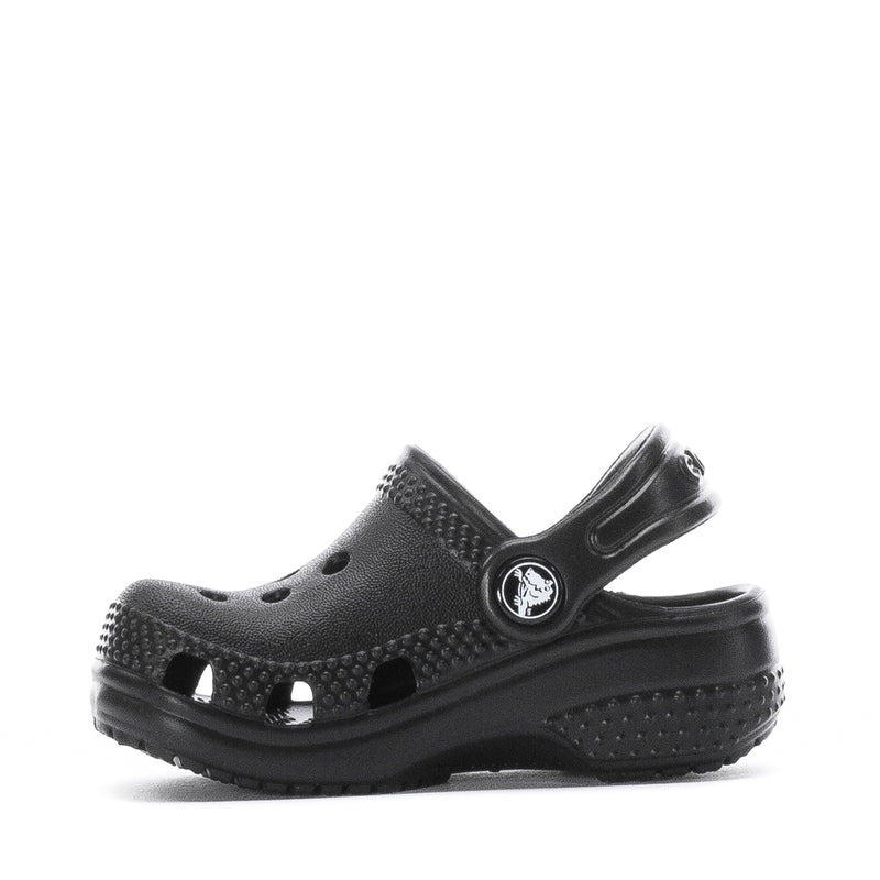 Infant black clog with perforations, slingback strap, and treaded outsole