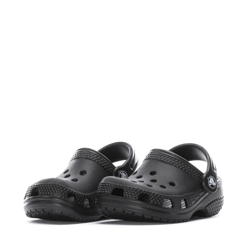 Pair of infant black clogs with perforated toe box and molded heel