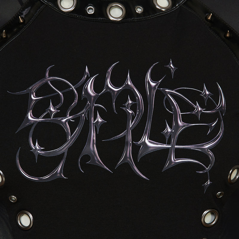 Metallic logo on a black background with studs