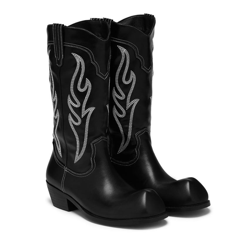 Black cowboy boots with flame patterns on a white background