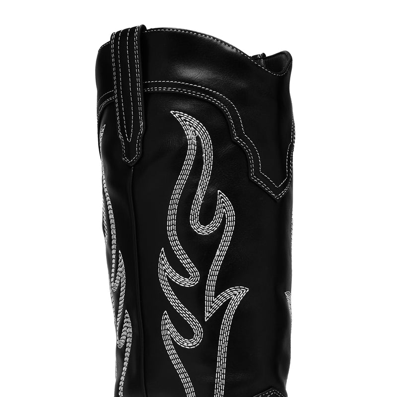 Black leather boot with white flame design on a white background