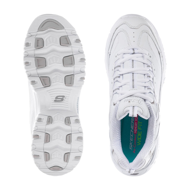 White sneaker outsoles with S logo and molded traction pods