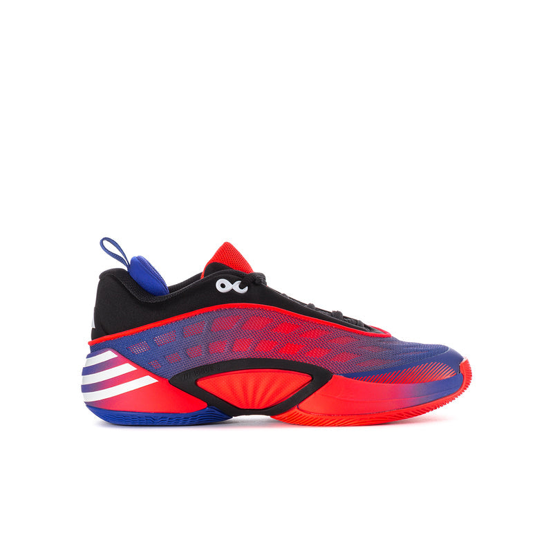 Youth basketball shoes in red, blue, and black with lace-up upper and striped sole