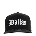 Black baseball cap with white Dallas script logo and curved brim