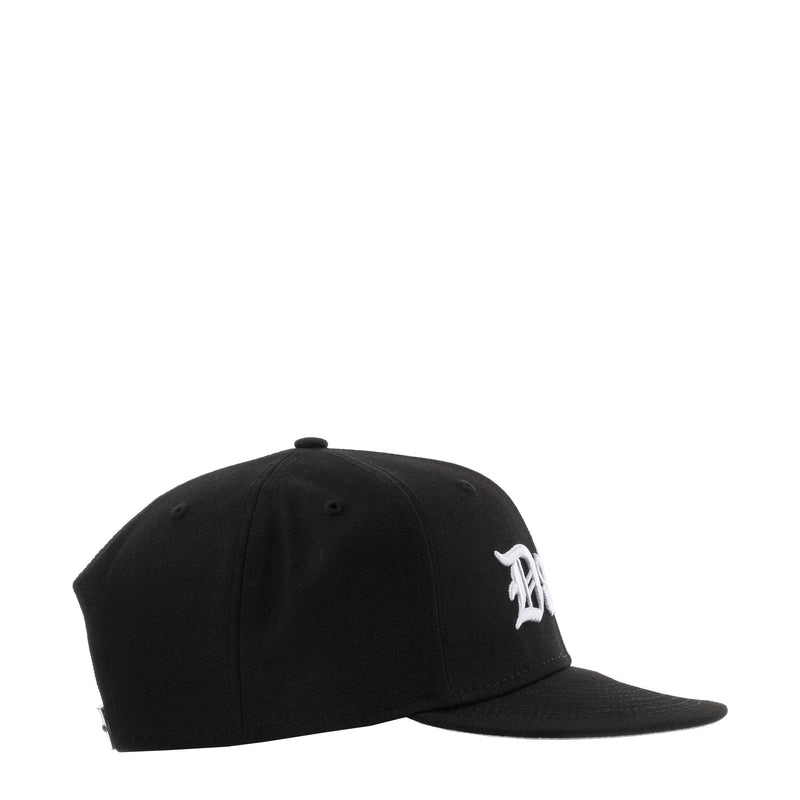 Black baseball cap with small white side logo and curved brim