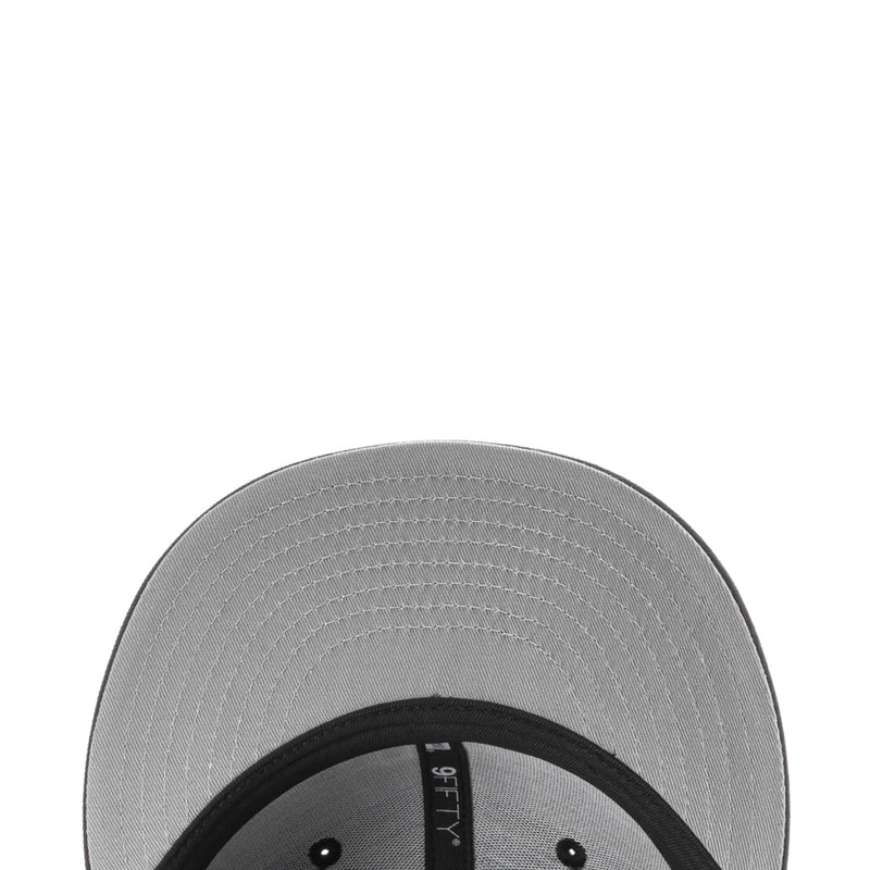 Gray inner brim with black edge and stitched texture on baseball cap
