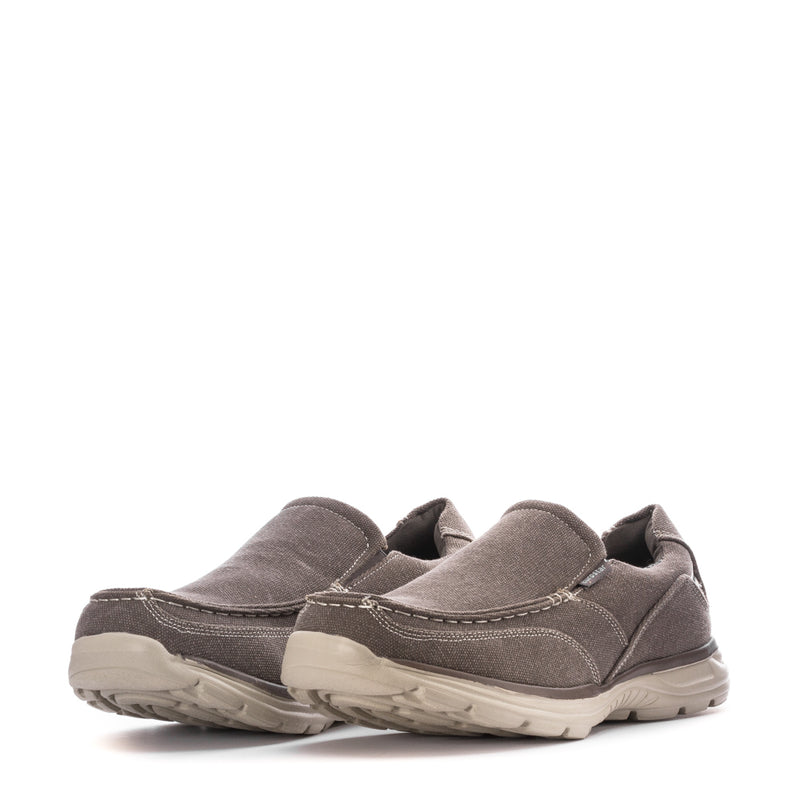 Dark grey pair of slip-on casual shoes with elastic side panels
