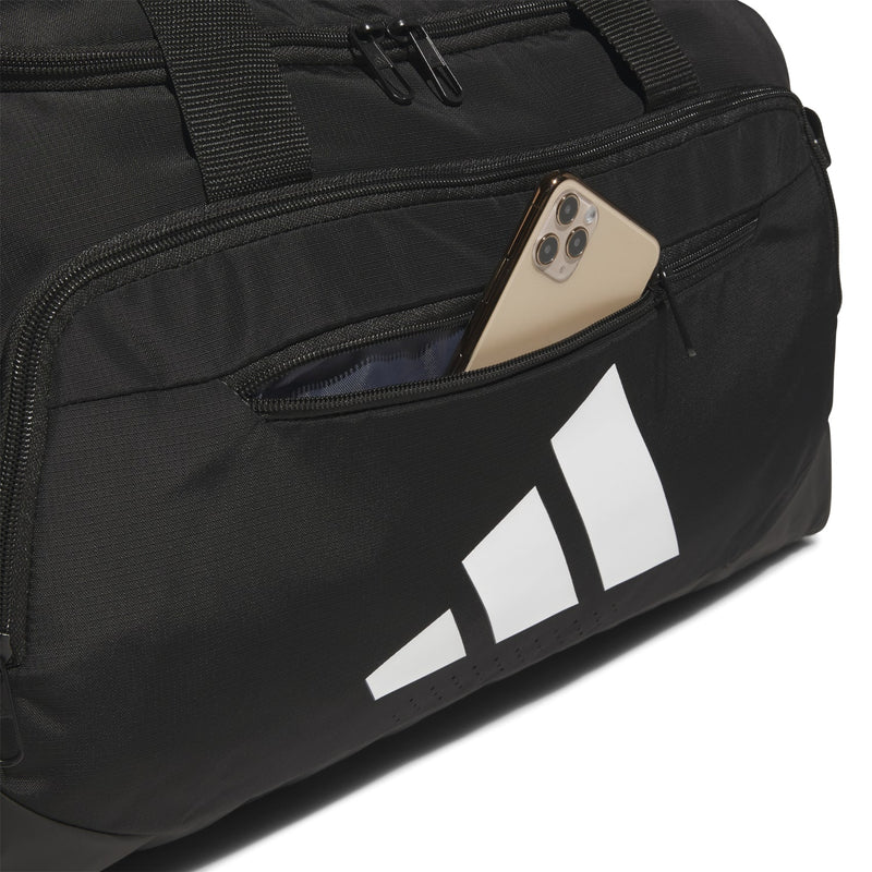 Black small duffel bag side pocket with visible white logo stripes and zip access