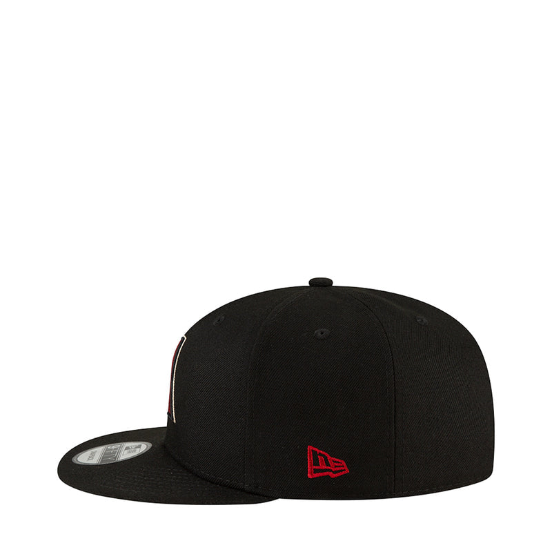 Black baseball cap with New Era logo tab on the side
