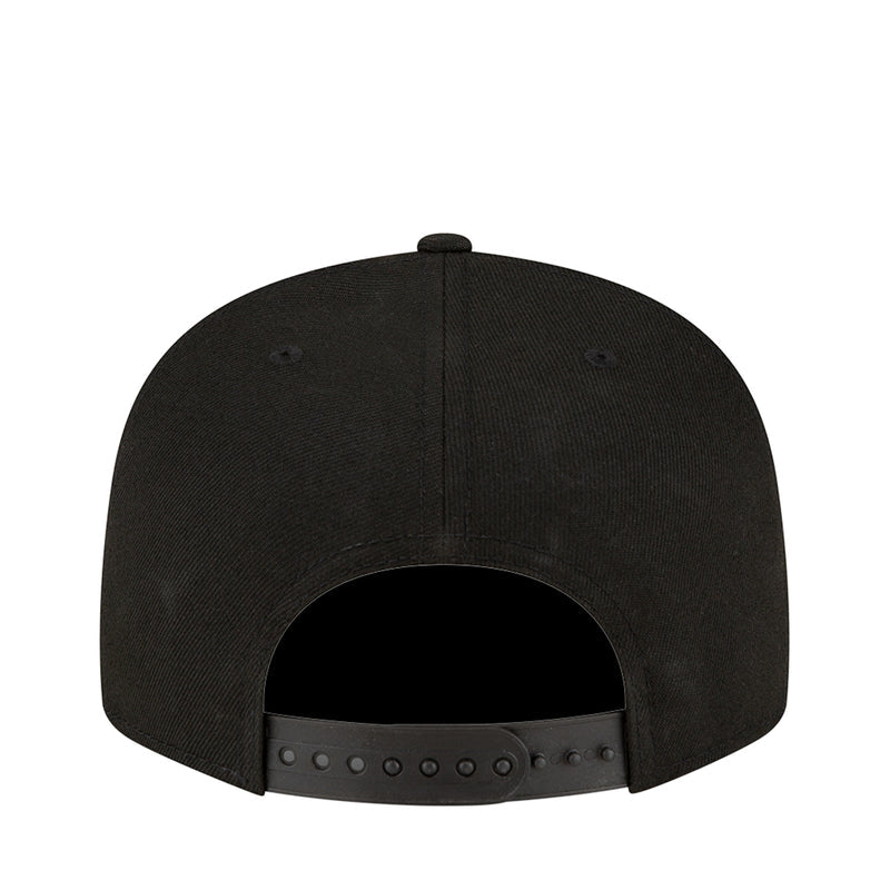 Black baseball cap back view with ventilation eyelets and snapback adjuster.