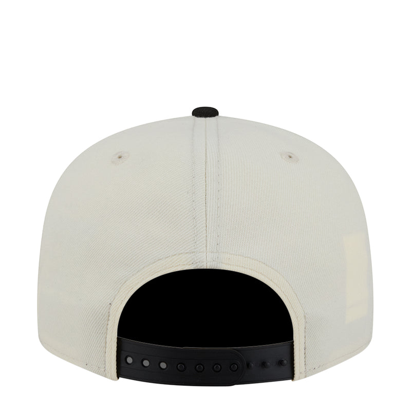 White baseball cap front view with black inner band and button-top closure
