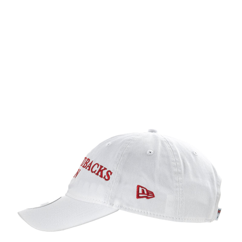 White Diamondbacks fan cap angled view with partial red 'BACKS' wordmark and small red logo