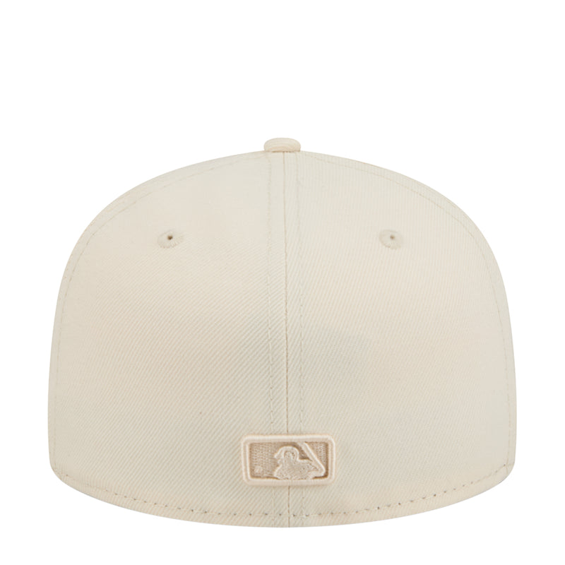Light cream baseball cap with small rear logo patch and ventilation eyelets