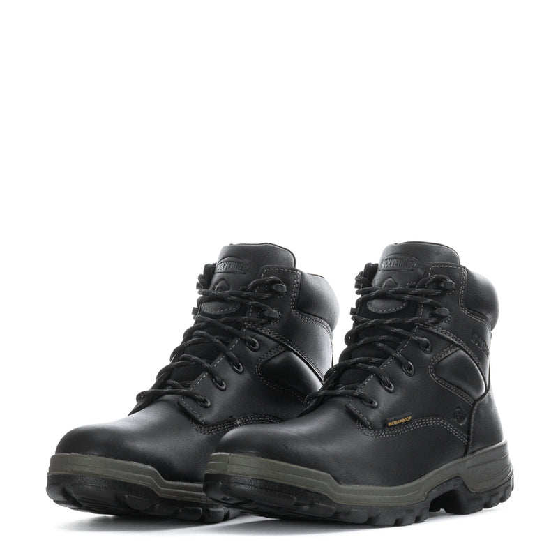 Pair of black lace-up work boots with padded tongue and durable rubber outsoles