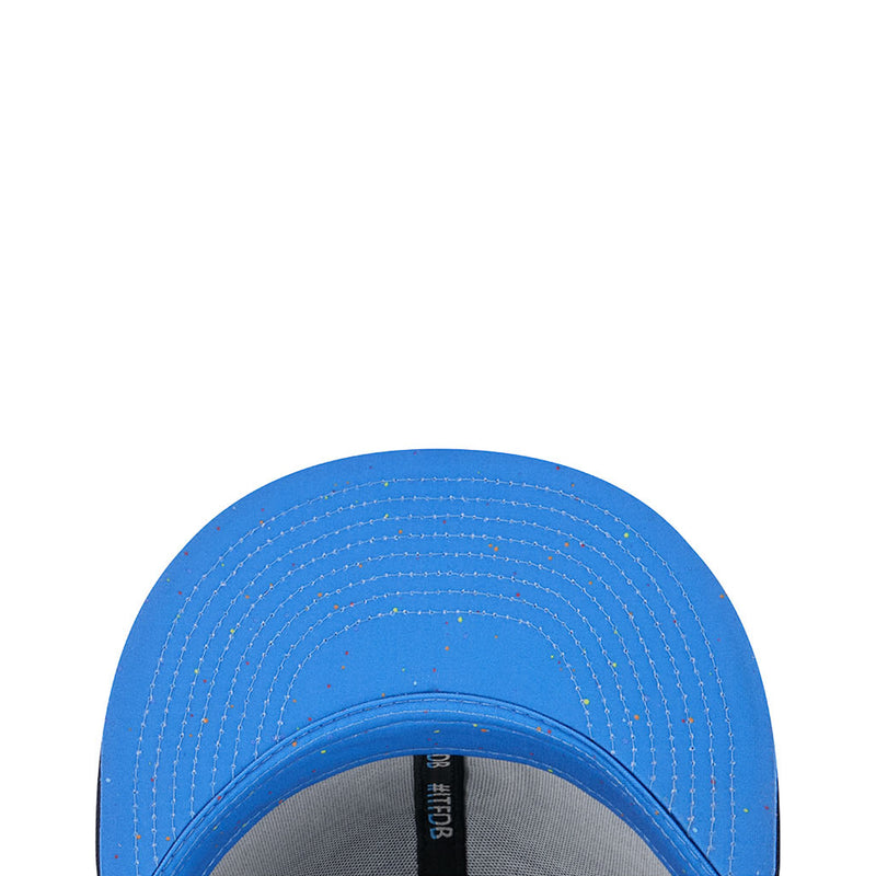 Blue underside brim of kids baseball cap with white contrast stitching