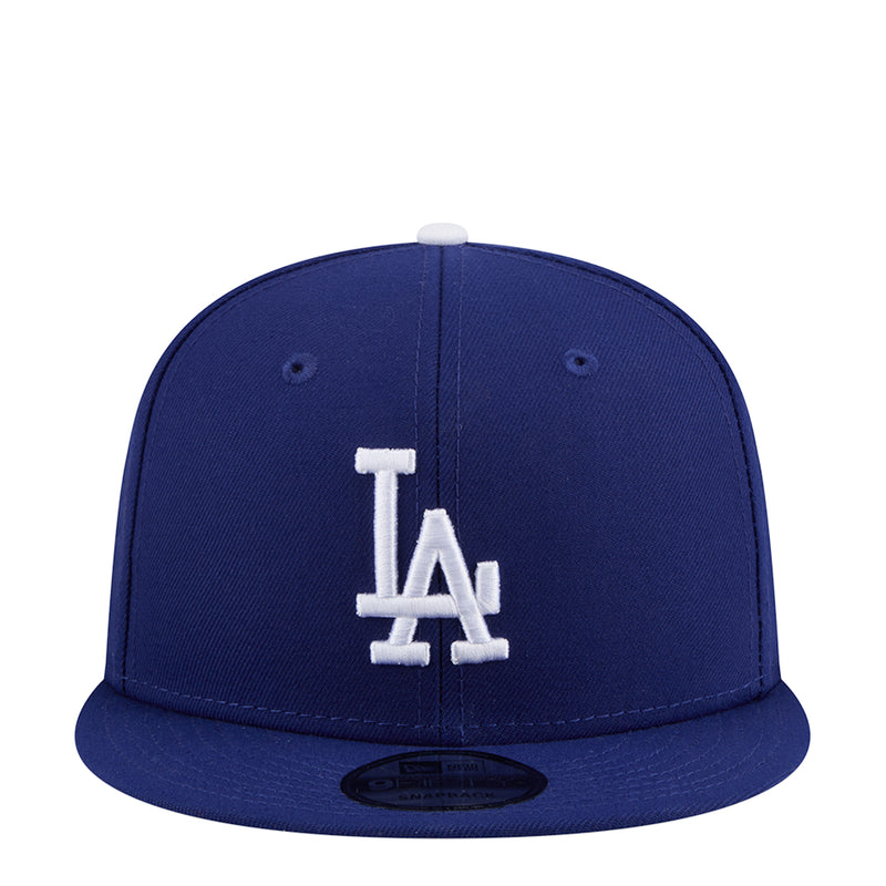 Royal blue baseball cap with white LA logo on front