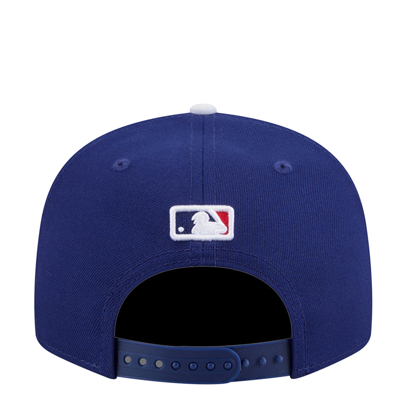 Royal blue baseball cap with white MLB logo on back